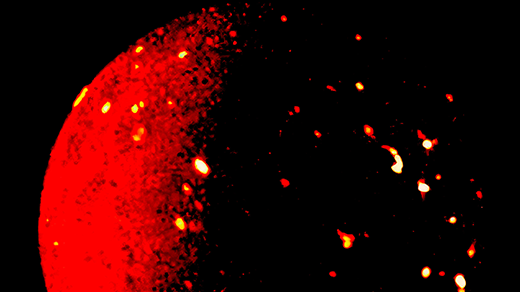 An image of a glowing red orb dotted with white-hot active volcanoes.